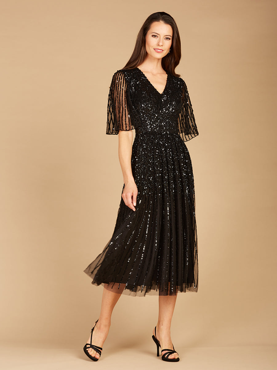Vestido midi de lentejuelas fluidas con mangas cortas | 29221