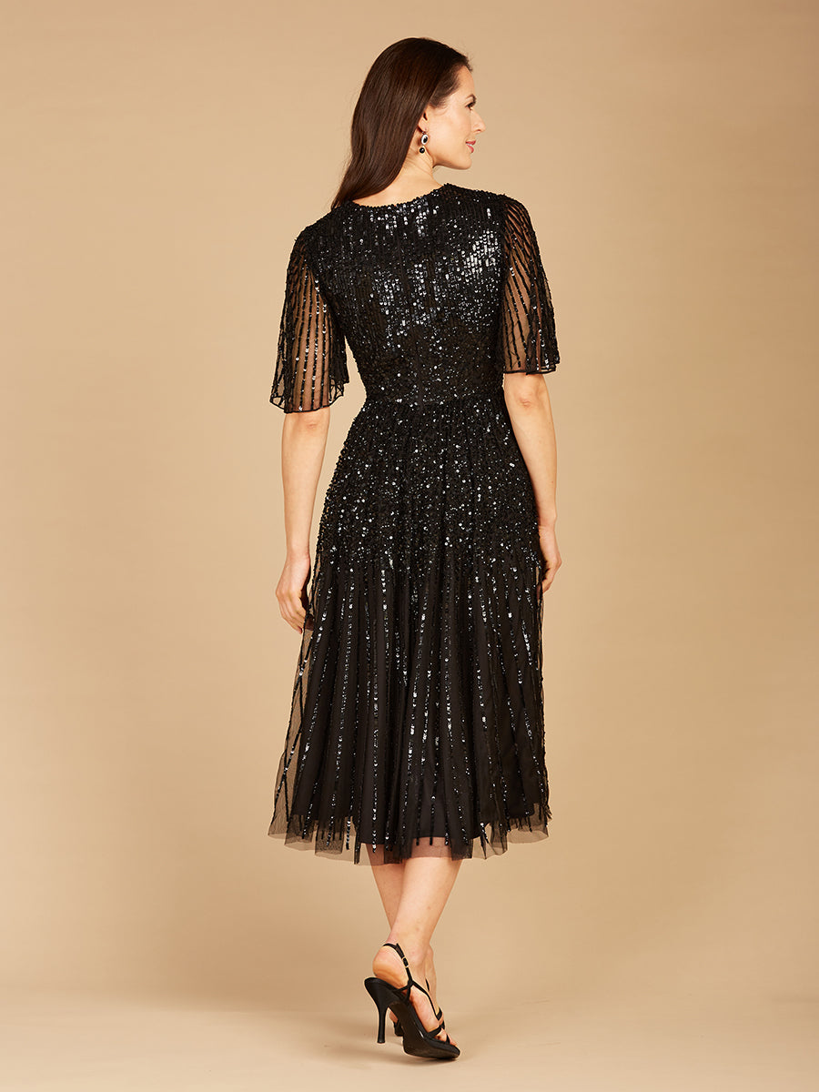 Vestido midi de lentejuelas fluidas con mangas cortas | 29221