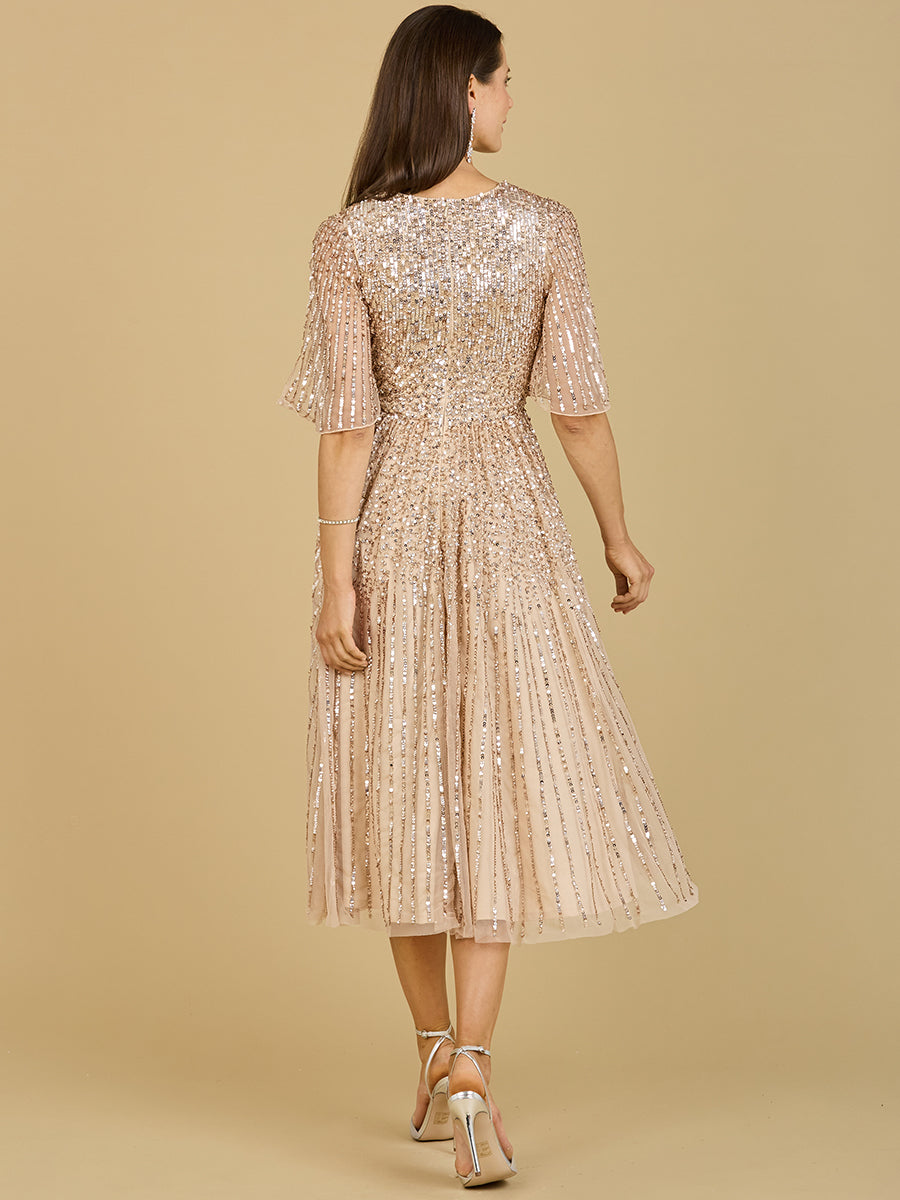 Vestido midi de lentejuelas fluidas con mangas cortas | 29221