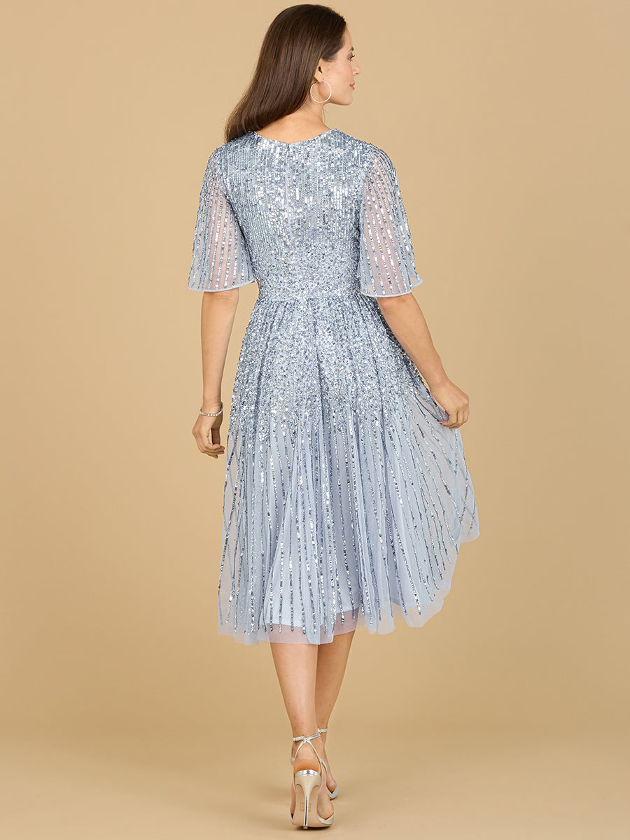 Vestido midi de lentejuelas fluidas con mangas cortas | 29221
