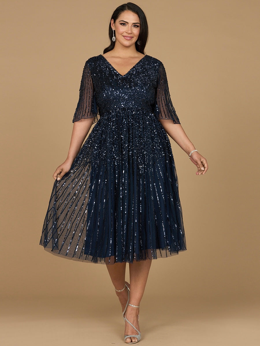 Vestido midi de lentejuelas fluidas con mangas cortas | 29221