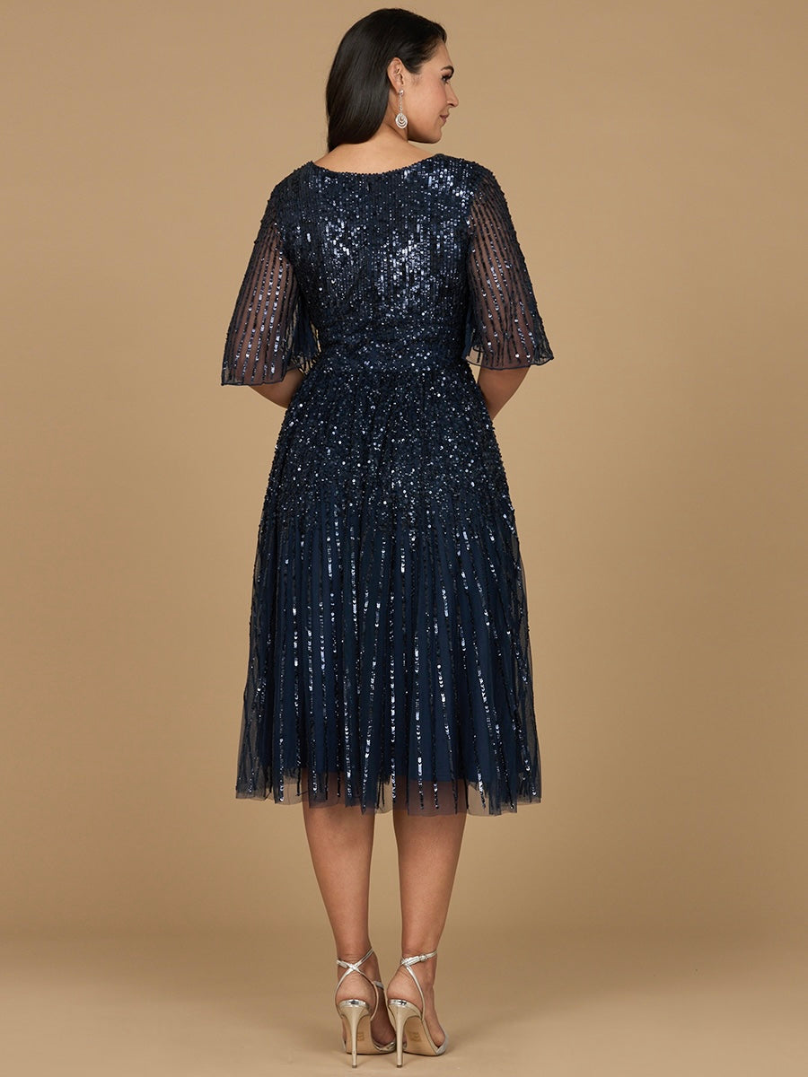 Vestido midi de lentejuelas fluidas con mangas cortas | 29221